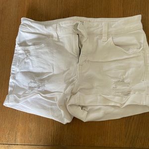 Ripped white shorts